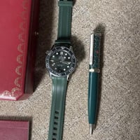 طقم ساعة اوميقا وقلم كارتييه