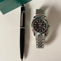 طقم ساعة وقلم