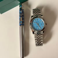 طقم ساعة وقلم