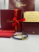 إساورة جلد اسود