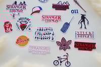 مجموعة ملصقات بتصميم Stranger Things