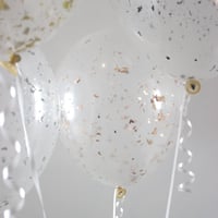 بالون شفاف مع سبرينكلز : ذهبي | فضي | أسود | قولدن...