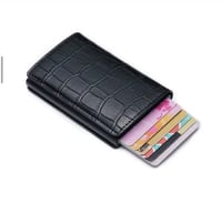 محفظة ذكية croc بزر لاخراج البطاقات