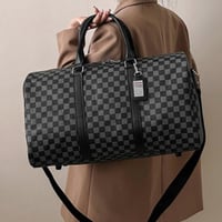 حقيبة للسفر الانيقه بنمط المربعات