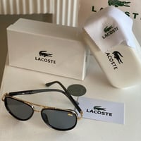 نظارة ماركة لاكوست مع الملحقات