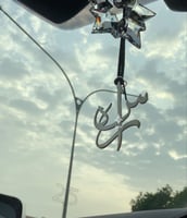 تعليقه سياره نسائيه بالاسم