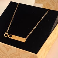 سلسال معدني ذهبي