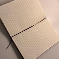 دفتر خشبي تصميم من اختيارك