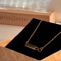 سلسال معدني ذهبي