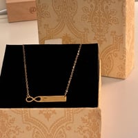 سلسال معدني ذهبي