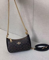 حقيبة كوتش تيري ميني coach