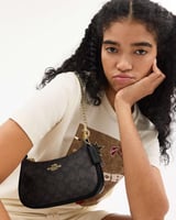 حقيبة كوتش تيري ميني coach