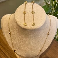 طقم وردات ذهبي سلسال + حلقان