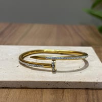 أسوارة مسمار ذهبي و زيركون