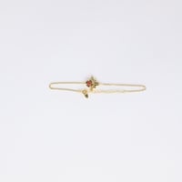 أأسوارة | الفريد | ذهبي بحجر أحمر داكن