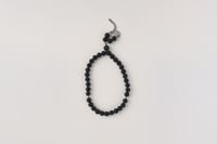 سبحة | الحجر البركاني | العملة السعودية