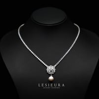 طقم اكسسوار دونيلا فات المميز بتصميم ورده مشعه