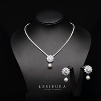 طقم اكسسوار دونيلا فات المميز بتصميم ورده مشعه