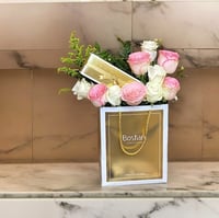 تشوكلت بستاني بتنسيق وردي وأبيض