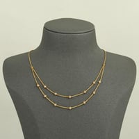 عقد كرات الذهب دورين ( عيار 21 )