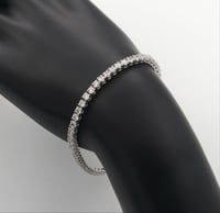 اسوارة ذهب ابيض تنسي ( عيار 18)