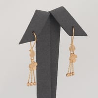 حلق ذهب الكرات المتدلية ( عيار 21 )