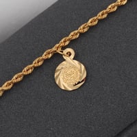 اسوارة مبرومة ذهب جنيهات ( عيار 21 )