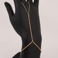 كف كرات الذهب المتباعدة ( عيار 21 )