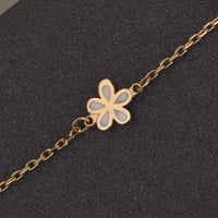 اسوارة ذهب الزهور باللون الأبيض ( عيار 18 )