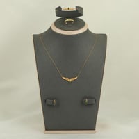 طقم ذهب جناح اخضر ( عيار 21 )