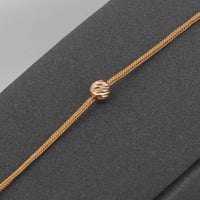 اسوارة ذهب كرات دوركا متباعدة ( عيار 21 )