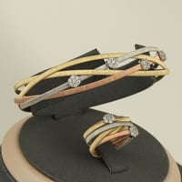 اسوارة وخاتم ميكس ( عيار 18 )