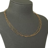 طقم خيوط الذهب المموجة ( عيار 18 )