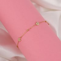 اسوارة ذهب الزهور باللون الأبيض ( عيار 18 )