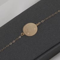 اسوارة ذهب جنيه ( عيار 18 )