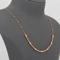 عقد كرات الذهب المتقاربة ( عيار 21 )