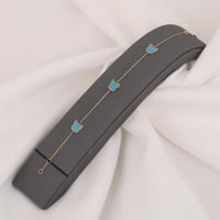 اسورة ذهب الفراشات باللون الفيروزي ( عيار 18 )