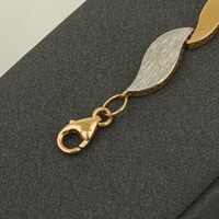 اسوارة ذهب مموجة وجهين ( عيار 18 )