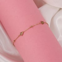 اسوارة ذهب الزهور باللون العودي ( عيار 18 )