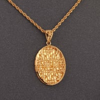 طقم ذهب بيضاوي منقوش ( عيار 21 )