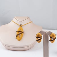 طقم ذهب الأسطورة البيضاوي( عيار 21)