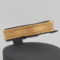 اسورة ذهب دوريكا (عيار 21)