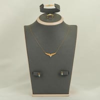 طقم ذهب جناح مع فص فيروزي ( عيار 21 )