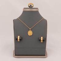 طقم ذهب بيضاوي منقوش ( عيار 21 )