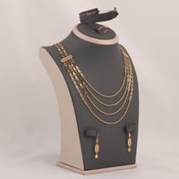 طقم ذهب مبروم ثلاث أدوار ( عيار 21 )