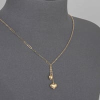 عقد ذهب جنزير وقلوب متدلية ( عيار 18 )