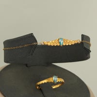 طقم ذهب جناح مع فص فيروزي ( عيار 21 )