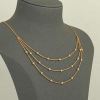 عقد كرات الذهب ثلاثة أدوار ( عيار 21 )