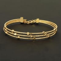 اسورة ذهب ثلاث ادوار ماركة ( عيار 18 )