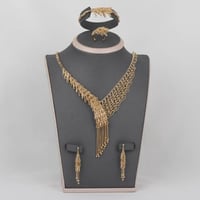 طقم ذهب الرشارش بجانبين مميز (عيار 18)